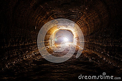 Abandoned prospecting adit. Tunnel at limestone at abandoned mine Stock Photo