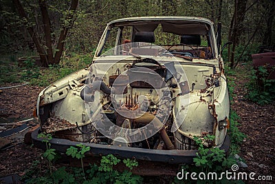 Abandoned and robbed old cars standing in the open air Editorial Stock Photo