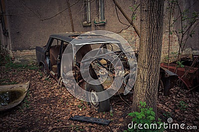 Abandoned and robbed old cars standing in the open air Editorial Stock Photo