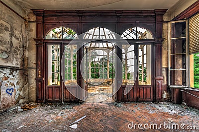 Abandoned room with view through beautiful broken conservatory Stock Photo