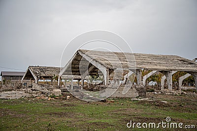 Abandoned ruined farm structures Stock Photo