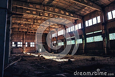 Abandoned ruined industrial factory building, corridor view with perspective, ruins and demolition concept Stock Photo