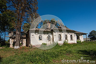 Abandoned rural house with green door in Parkhomivka Stock Photo