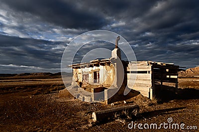 Abandoned rural house landscape dramatic cloud sky Stock Photo