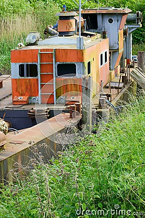 Abandoned rusty boat, abandoned ship Stock Photo
