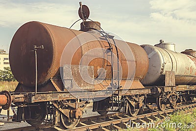 Abandoned rusty railway containers Stock Photo