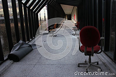 Abandoned 70s Modernist Office Building with Glass Window Hallway Stock Photo