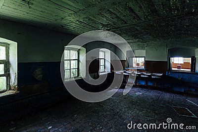 Abandoned school interior, dirty room, rotten peeled walls Stock Photo