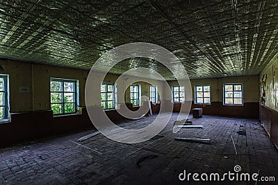 Abandoned school interior, dirty room, rotten peeled walls Stock Photo