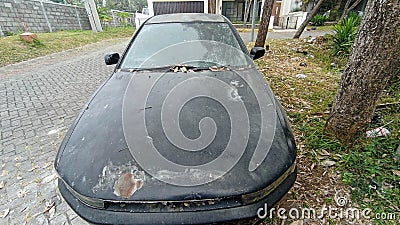 Abandoned black car sedan Stock Photo
