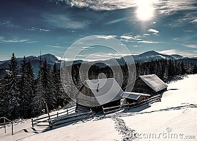 Abandoned snow-covered cabins Stock Photo