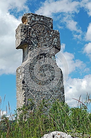 Abandoned stone cross landmark Stock Photo