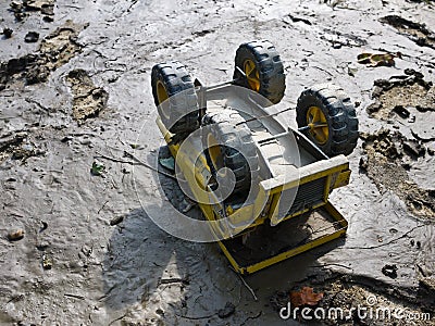 Abandoned Toy Truck on Playground Editorial Stock Photo