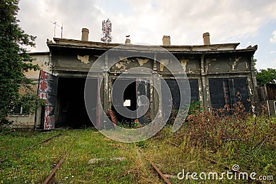Abandoned train depot left to decay Stock Photo