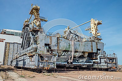 Abandoned transport and installation unit `Grasshopper` for spaceship Buran and Energy launch vehicle at cosmodrome Baikonur Stock Photo