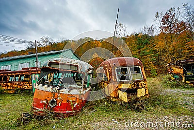 Abandoned Trolley Cars in Fall Stock Photo