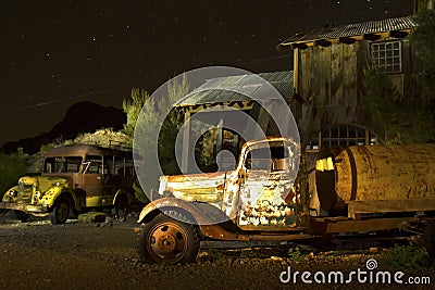 Abandoned Truck and School Bus in Ghost Town Stock Photo