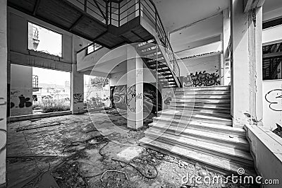 Abandoned vandalized office building, black and white Editorial Stock Photo