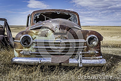 Abandoned vintage green car on the Saskatchewan prairies Stock Photo
