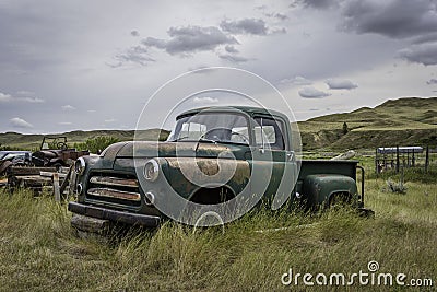Abandoned vintage green pick up truck on Saskatchewan prairies Editorial Stock Photo