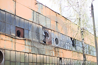 Abandoned workshop with broken windows Stock Photo