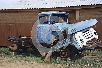 Abandonned car in a siberian village on Olkhon Island, Baikal Lake, Russia Stock Photo