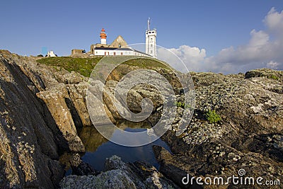 Abbey ruin and lighthouse, Pointe de Saint-Mathieu, Brittany, France Stock Photo