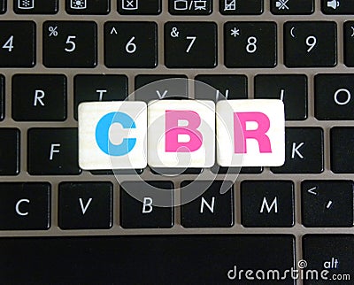 Abbreviation CBR on keyboard background Stock Photo