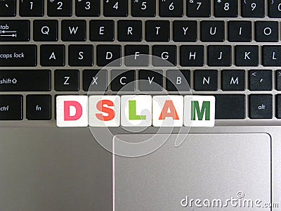 Abbreviation DSLAM on keyboard background Stock Photo