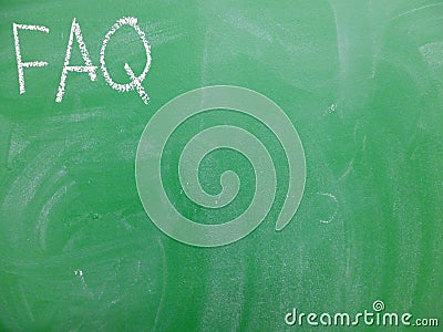 Abbreviation FAQ frequently asked questions written on a green, relatively dirty chalkboard by chalk. Located in the upper left Stock Photo