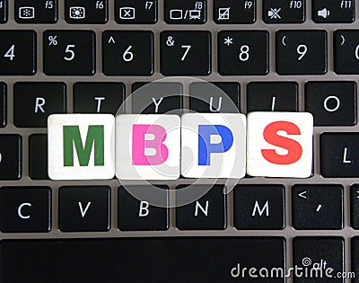 Abbreviation MBPS on keyboard background Stock Photo