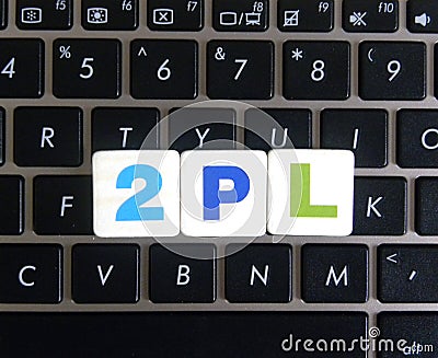 Abbreviation 2PL on keyboard background Stock Photo