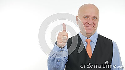 Businessman Image Smiling and Making Good Job Sign Thumbs Up Stock Photo