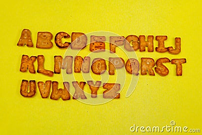 Abc cookies alphabet yellow background. stock photo XYZ Stock Photo