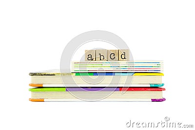 Abcd word on wood stamps and children's board books Stock Photo