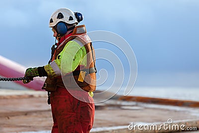 Able seaman working on deck during offshore rig move operation wearing safety equipment Editorial Stock Photo