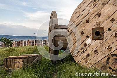 Abondoned Wooden Electric Cable Reels at Sunset Stock Photo