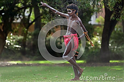 Aboriginal Australians man dancing traditional dance during Australia Day celebrations Editorial Stock Photo