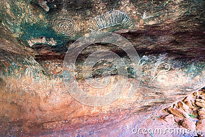 Aboriginal cave painting inside the family cave or kulpi mutitjulu at Ayers rock in outback Australia Editorial Stock Photo