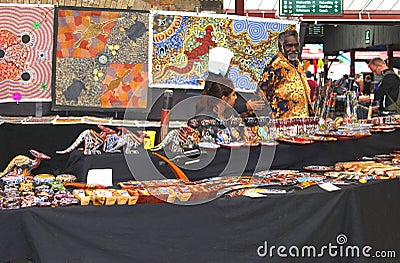 Aboriginal man sells Aboriginal art at the Queen Victoria Market,Melbourne,Australia Editorial Stock Photo