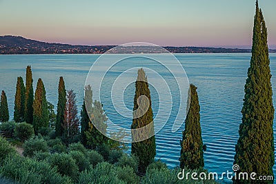 Above lake Garda coastline in Lazise at sunset, Northern Italy Stock Photo