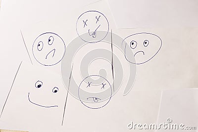 From above reminder notes with drawn smileys Stock Photo