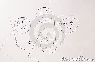 From above reminder notes with drawn smileys Stock Photo