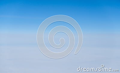 Above view many little clouds in blue sky from airplane Stock Photo