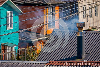 Above view of rooftop of colorful houses in the horizont located in Castro, Chiloe Island Stock Photo