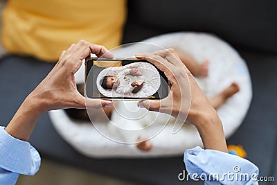 Photographing baby in cocoon Stock Photo
