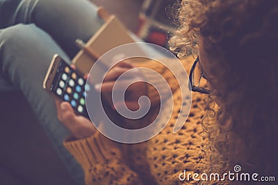 Above view of woman alone using mobile phone app gadget touching display. Online social media lifestyle people. Searching the net Stock Photo