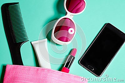 Above view of woman bag stuff . Set of female cosmetics and accessories. Glamour tools and beauty objects Stock Photo