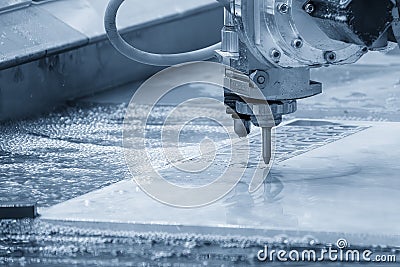 The abrasive waterjet cutting machine in the light blue scene Stock Photo