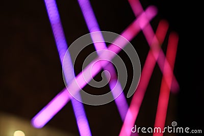 ABSTARCT COLORED BLURRED NIGHT LIGHT. MODERN ARCHITECTURE BUILDING Stock Photo